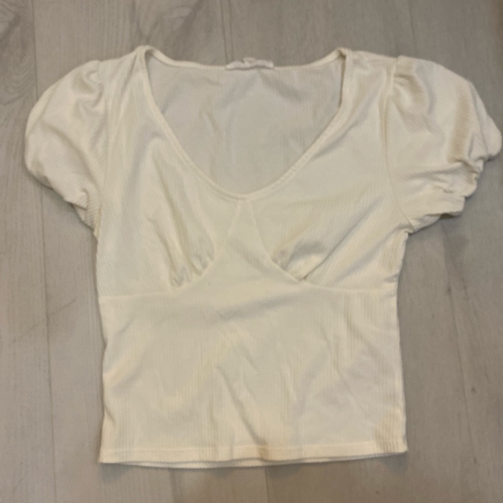 Pink Rose white tee shirt in size medium.